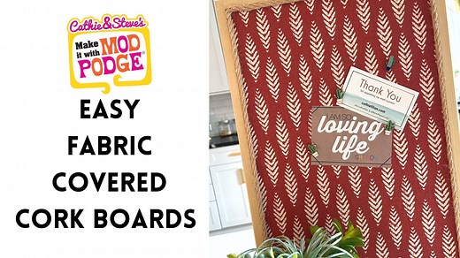 Spruce up your desk and office space with a custom fabric covered cork board! They are easy to make and Cathie from Handmade Happy Hour with Cathie Filian and Steve Piacenza will show you all the steps. Plus, she is sharing a bonus idea for a napkin decoupaged planter or pencil cup. 💛 Learn more about and shop Mod Podge at https://plaidonline.com/brands/mod-podge​ 🎨 Watch more Make It With Mod Podge: http://bit.ly/MakeItWithModPodge | Plaid Crafts