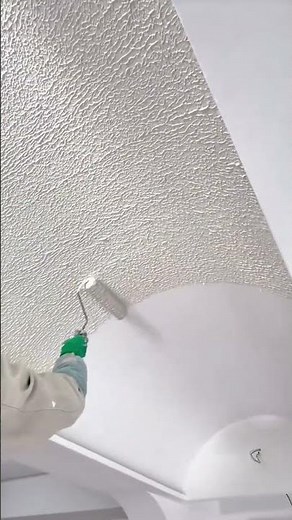 Applying white paint evenly on textured ceiling using roller tool #shorts