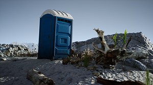 Portable mobile toilet in the beach. chemical WC cabin