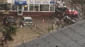 Paignton in Devon is submerged in water as ice melts