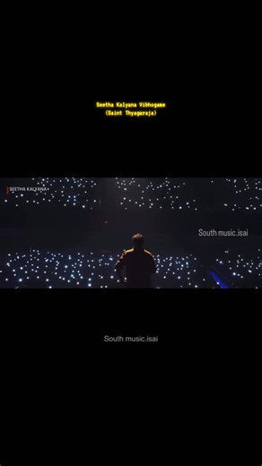 Black Dot | Design by Akhil on Instagram: "Over 2000+ people sang this live together — a massive, once-in-a-lifetime musical moment. Project: Walk of the Bride / Vaibhavam Vocals: Harish Sivaramakrishnan Lyrics: Saint Thyagaraja / Swamy Seetharaman Music: Agam Featured Artists: O.K. Gopi (Nadaswaram), Sreekumar Thrippunithura (Tavil) Ensemble: Aavani Malhar Choir & Full Live Orchestra A grand Carnatic symphony reborn. From Seetha Kalyana Vibhogame to Vaibhavam, this performance blends classical 