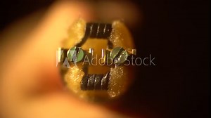 The atomizer of the electronic cigarette without the case is very smoky, the top view. Slow motion shooting