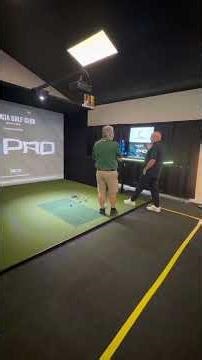 Golf simulation of driving range practice