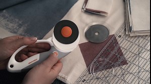 Fiskars Rotary Cutter, Titanium Coated Precision Blade, Cuts Fabric and Vinyl, 45mm, SoftGrip Handle for Comfort