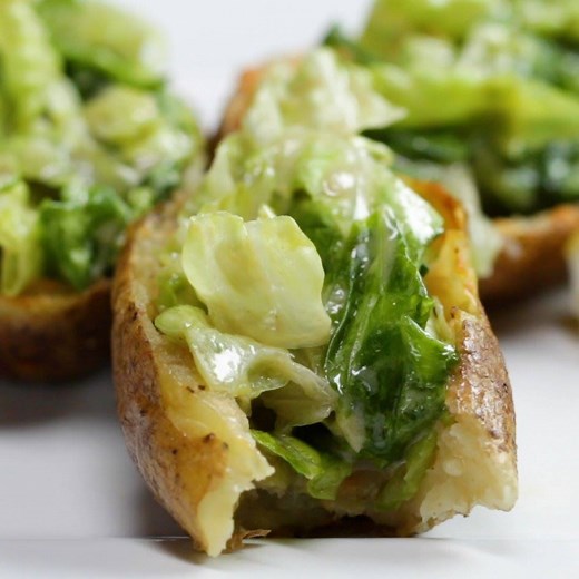 418K views · 1K reactions | Brushed with tangy dressing and filled with cheesy bread crumbs and crunchy dressed romaine, these Caesar salad potato skins have it all! Serve at your next party for a refreshing, satisfying bite. Recipe: https://tasty.co/recipe/caesar-salad-potato-skins | Tasty | Facebook