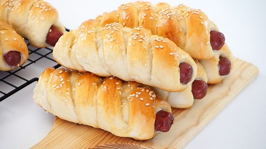 Sausage Rolls Bakery Style How to make a sausage bread rolls. This recipe yields 16 sausage bread rolls. Here's what you'll need: Ingredients: 1 cup milk (250ml) 1 egg (65g) 3 and 1/2 cup all purpose flour (437g) 1/4 cup sugar (50g) 2 and ¼ teaspoon instant yeast (6-7g) 1 tsp salt (5g) 4 tbsp unsalted butter (softened) 16 pcs cooked sausages or hotdogs eggwash: 1 egg 2 tbsp milk beaten 1 tablespoon sesame seeds for toppings | Savor Easy