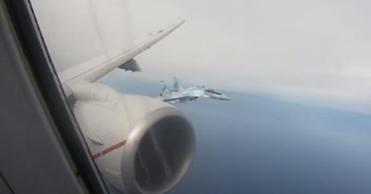 Armed Russian jets fly close to U.S. plane