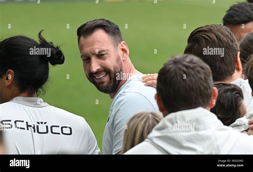 Bielefeld, Germany. 17th May, 2026. Soccer, Men, Bundesliga 2, DSC Arminia Bielefeld - Hertha BSC, Matchday 34, Schüco Arena. Coach Mitch Kniat (Arminia Bielefeld) has secured relegation and is celebrating. The game ended 6:1. Credit: Carmen Jaspersen/dpa - IMPORTANT NOTE: In accordance with the regulations of the DFL German Football League and the DFB German Football Association, it is prohibited to utilize or have utilized photographs taken in the stadium and/or of the match in the form of seq