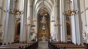 If you’re going to church in Vienna, you could try to attend the Hofburg Palace's Imperial Music Chapel, where the Vienna Boys’ Choir sings — but it’s really crowded, and you’ll likely be hanging out in the lobby listening to them or perhaps watching on a monitor. But the Augustinian Church — also part of the vast Hofburg Palace complex — is more likely to have a pew for you, and they also host regular concerts. Let me give you a quick little tour with this clip. It’s Sunday morning, the Mass wa