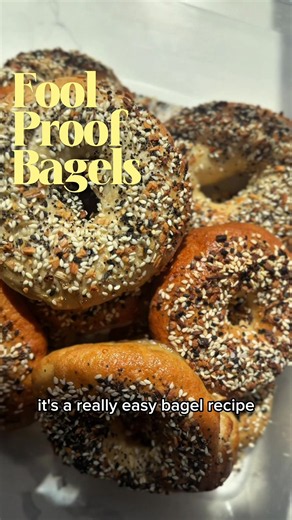 The easiest bagel recipe 500g strong white flour 300g warmish water 7g instant yeast (or a teaspoon) 10g salt Teaspoon of sugar or honey To top Everything bagel seasoning 1 egg white For when you boil Teaspoon of bicarb Tablespoon of honey, sugar or treacle Mix all bagel ingredients Knead 8-10 minutes but hand or stand mixer 5 minutes Oil bowl Cover and leave to proof in warm place until doubled Drop onto floured surface Divide into 12 or however many you want Fold edges into middle Turn over an