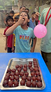 1.9M views · 14K reactions | A fun challenge where kids eat gulab jamun after inflating a balloon #game #video #trending #viralreels #entertainment #best | Sohan X Gamer | Facebook
