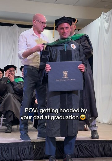 Father Hoods Son at Medical Graduation: Emotional Moment