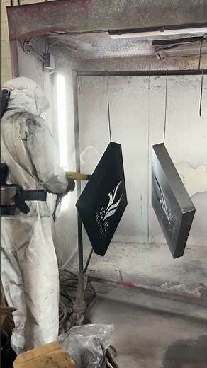 Powder coating our new signs