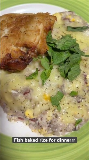 Leftover British fish with baked rice and mint garnish