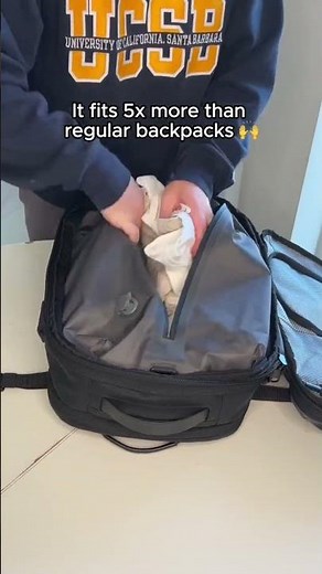 I packed a whole suitcase in my backpack 🎒 #travel #packing #shorts