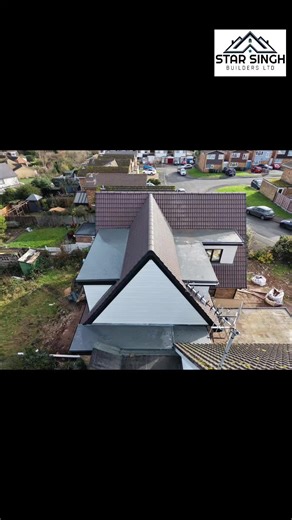 Innovative Roof Extension with Dormers and Garage