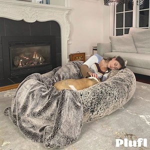Human-Sized Dog Beds are Real and They're a Surprisingly Great Way to Snuggle With Your Pup