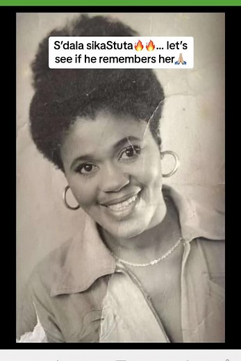 Elderly Man Remembers Loved One in Cozy Room