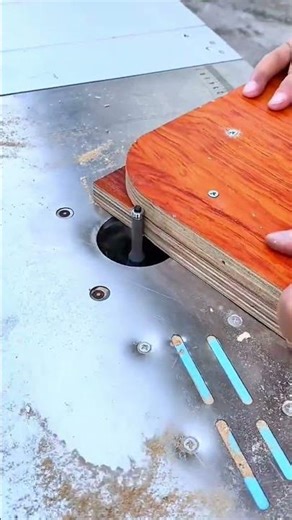 Using a router table with a flush trim bit to perfectly duplicate the curved shape of a plywood