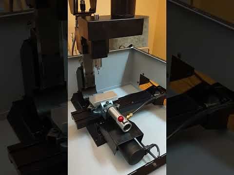 This is a demonstration of a Light Machines Spectra Light cnc milling machine