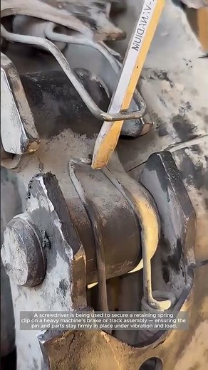 Installing a Retaining Spring Clip on Heavy Machinery