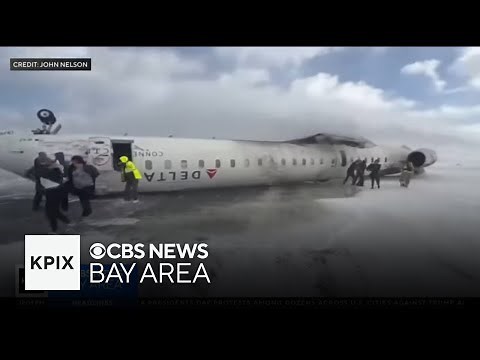 Video shows Delta plane crash at Toronto airport; passenger describes escape