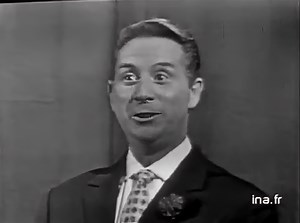 Charles Trénet - Le jardin extraordinaire (Live) (1957) "Le jardin extraordinaire," released in 1957 by Charles Trénet, is a whimsical ode to the wonders of nature and the imagination. Known as "Le Fou Chantant" (The Singing Madman), Trénet was famed for his poetic lyricism and unique voice, qualities that shine brightly in this song. Inspired by his love for nature and a penchant for whimsy, Trénet crafts a vivid narrative set in a magical garden—a haven where animals talk, flowers sing, and tr