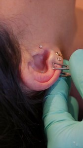 9.2M views · 18K reactions | Joslyn and Sinead get CUSTOM constellation piercings from the creator himself, Brain Keith Thompson! We swear it only hurt a little. | Clevver | Facebook