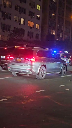 United States Secret Service Passing By On 1st Ave In Turtle Bay, Manhattan, New York City