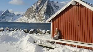 Woman enjoying the cold weather outside the house - Free Stock Video