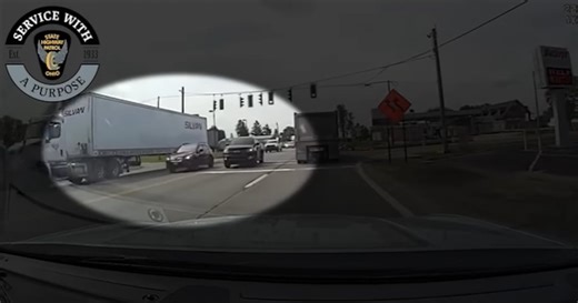 Driver stopped for crossing double yellow line to pass another vehicle