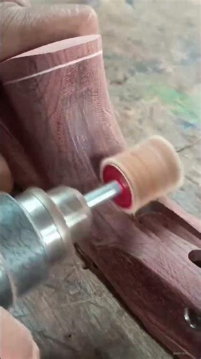 the process of smoothing the surface of wood