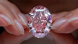 This is the 'Pink Star' diamond. It's a whopping 59.6 carats and recently sold for a record price for any diamond or jewel. | The Age