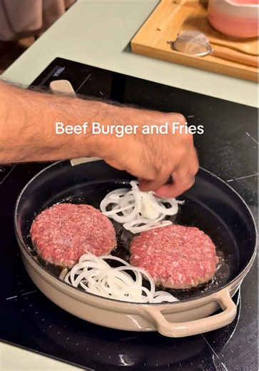 Beef Burger with Fries 🍔 Sometimes all you need is a simple burger and everything else just fades away 😌 The ultimate home meal, made with basic ingredients you can get from anywhere. There’s not much out there that can beat a burger and fries 🙌 #beefburger #cookwithme #dinnerathome