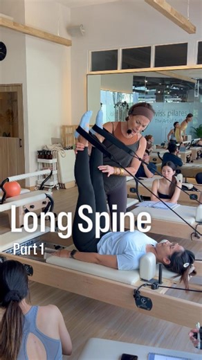 Patricia | Pilates Master Instructor on Instagram: "Long Spine | Part 1 In this teacher training segment, Long Spine is used as an assessment rather than simply an intermediate exercise. Spring selection and setup immediately reveal a client’s ability to stabilize the carriage, articulate the spine with control, and maintain lower-limb organization in the straps. Reducing spring tension increases the demand on the deep abdominals and posterior chain, while highlighting compensatory patterns. A k