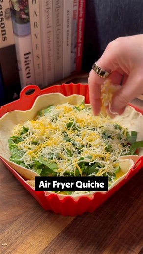 Allrecipes on Instagram: "Start your day right with @bullmarketfoodie’s Air Fryer Quiche. 🍳 Add your favorite toppings and let it carry you through a busy morning! Get the ingredients below and find the full recipe at the link in the @allrecipes bio. Have an original recipe video you’d like to see on our page? DM us for a chance to be featured! 🌟 Ingredients: - 1 burrito-size tortilla - 3 eggs - 1/4–1/3 cup cottage cheese - Favorite toppings (I used spinach & red pepper) - Shredded cheese - Sa