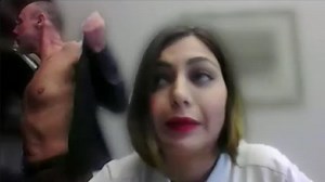 Kleon Grigoriadis strips off in front of the public administration committee as Maria Apatzidi tries to warn him