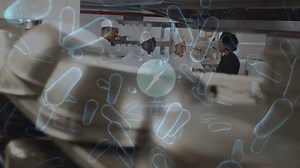 Animation of bacteria cells over diverse chefs talking. global business and digital interface during covid 19 pandemic concept digitally generated video.