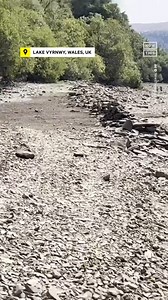 110K views · 129 reactions | As the UK experiences a heat wave and drought, Lake Vyrnwy in Wales is drying up and revealing a once-submerged underwater village. Llanwddyn was deserted in 1880 after a water reservoir for nearby Liverpool was approved, flooding the village. Hidden below the water, it hadn’t been seen since 1976 until the drying reservoir revealed it once again, 46 years later. | NowThis Earth | Facebook