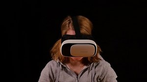 clip-1008061588-young-woman-enjoying-3d-glasses-experience-looking