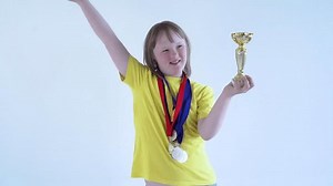 clip-1100392795-teenage-girl-blond-hair-yellow-t-shirt-medal