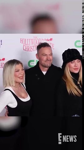 Tori Spelling, Brian Austin Green, Sharna Burgess pose