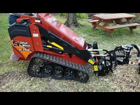 Erskine Mini Stump Grinder Attachment on Ditch Witch SK752 Mini Skid Steer