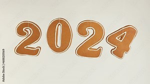 The year is 2024. The oscillating numbers 2024 are baked from gingerbread dough on a white background. Gingerbread numbers.