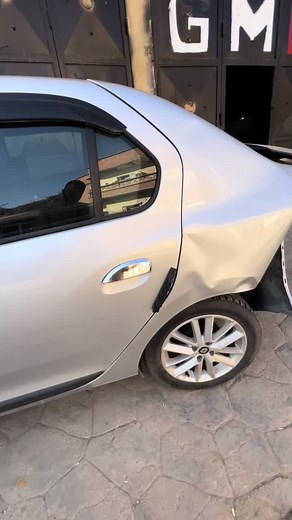 Severely Damaged Silver Sedan Cars on Street