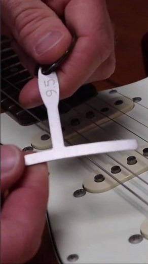 How to Adjust the Saddle on an Electric Guitar