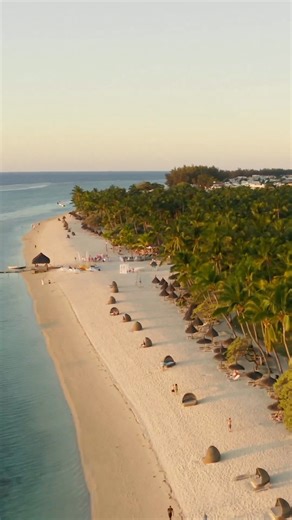 Mauritius Travel and Tourism on Instagram: "Welcome to the west coast of Mauritius 😌 Flic-en-Flac beach is one of the most popular beaches on the island. It is an ideal place to watch the sunset, while staying in the shadow of the coconut trees scattered along the white sand coastline. 🥰 📸 : @sladanagrzincic #mauritius #travel #tourism #flicenflac #discovermauritius #beachlife #islandlife #westcoast #sunsetlover #paradise"