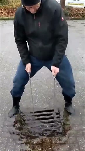 ￼ This is one way to properly remove the metal cover on a blocked water flow#creative