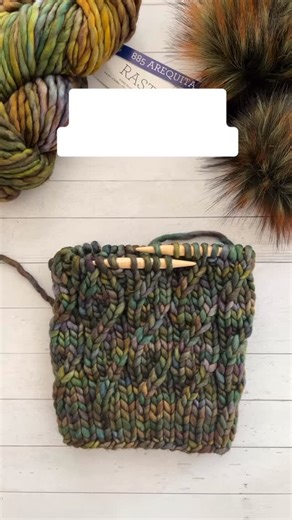 Yarn, poms, and the pattern can all be found at threebirdsyarnstudio.com. We have over 90 colors of @malabrigoyarn rasta and a large selection of poms in stock both online and in our Mundelein shop. The Hum Beanie gets its name because the delicate twists resemble hummingbird wings. It is written for 3 yarn weights (super bulky, bulky, and worsted). The pattern can be found on Ravelry and on our shop website. It is a quick one skein project and the twisted stitches look like faux cable knit twis