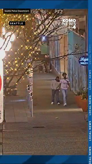 A newly released video shows two men attacking a 77-year-old man who was walking down the street in downtown Seattle last month.The incident was captured by the city's Real Time Crime Center surveillance cameras, which monitor public areas that have been identified as crime hot spots.In the video, the victim is seen walking slowly southbound on Third Avenue, approaching a pharmacy at the corner of Pike Street.Without any prior interaction, two men shove the man to the ground and punch him, the v